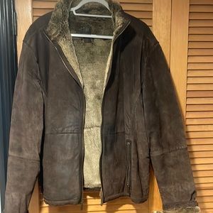 Men’s dark brown genuine leather/shearling jacket in good pre owned condition